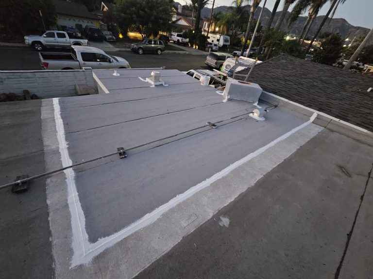 Flat roof leak repair by Crown Roofing and Repairs Inc