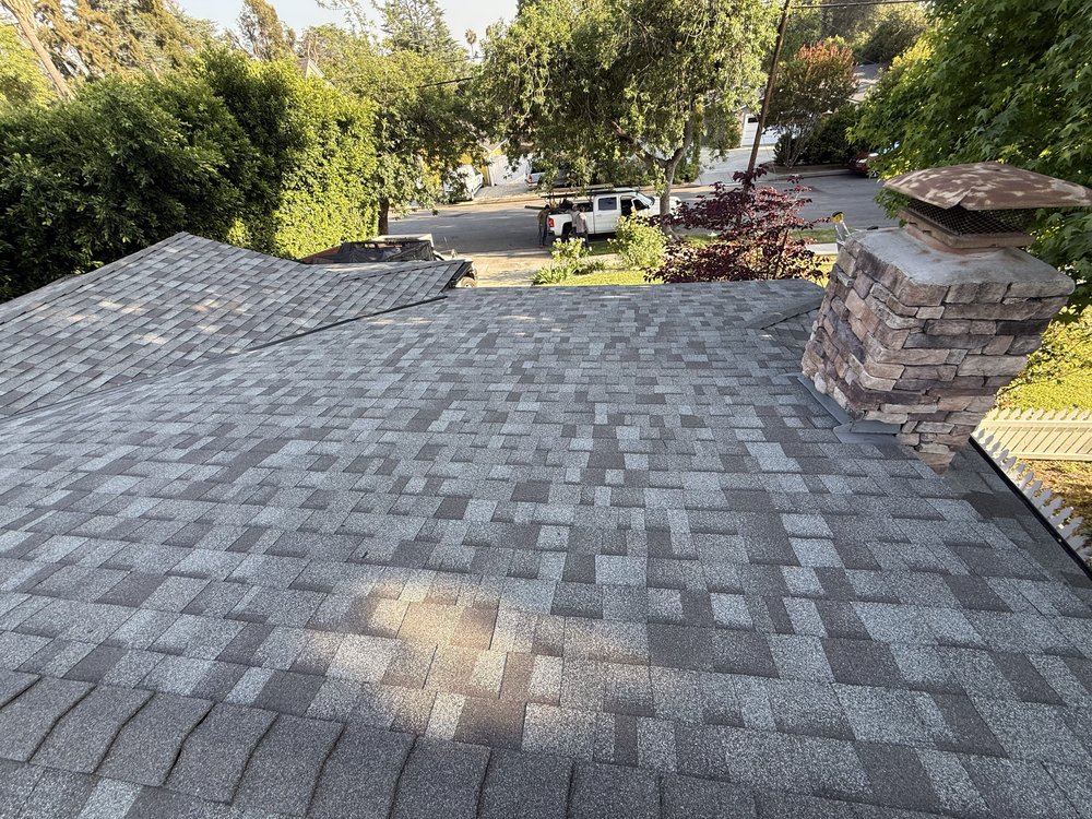 New cool roof shingle roof with a complete Owens Corning system by Crown Roofing and Repairs Inc
