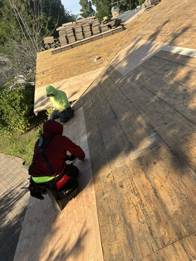 Wood repair on a new tile roof project in Northridge by Crown Roofing and Repairs Inc