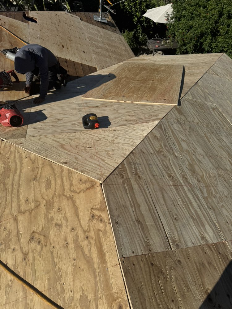 Shingle roof replacement with all new plywood decking by Crown Roofing and Repairs Inc