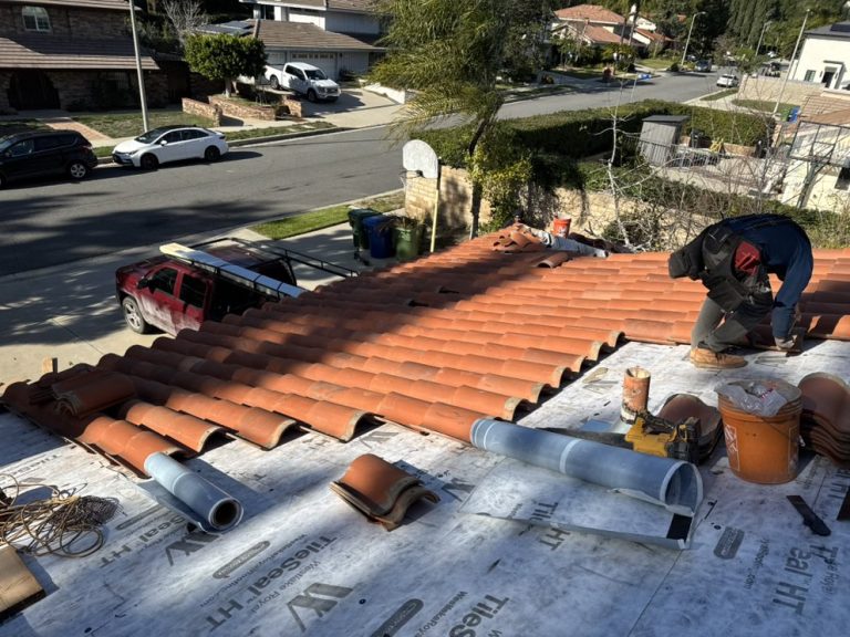 Tile lift and relay in progress in the San Fernando Valley by Crown Roofing and Repairs Inc